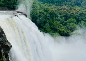 Athirapally water falls with Oberon Tours&Travels 