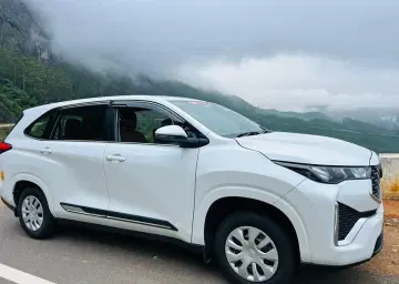 I cross car for Munnar trip with Oberon Tours