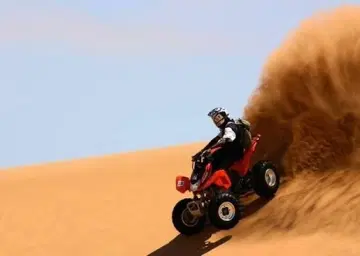 Quad Bike on Dubai Desert Camel Ride with Oberon Tours