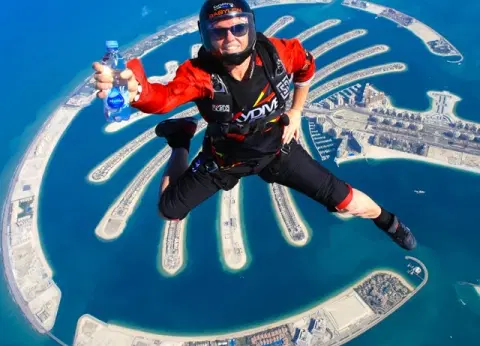 Skydive Dubai Tandem Jump with Private Transfers - Premium vacation packages from Oberon Tours